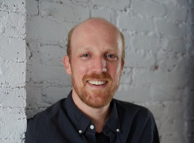 Kevin James Doyle smiles to camera