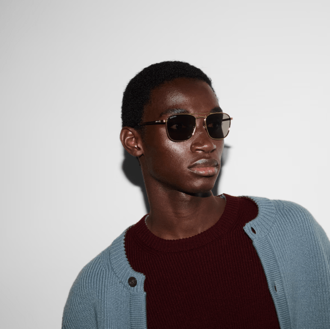 Model wears Gucci Square Frame Sunglasses