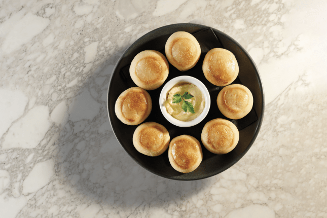 Dough balls on a plate from Pizza Express