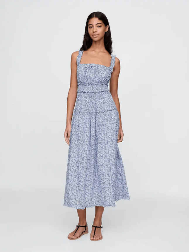 Model wearing blue DÔEN Floral Maxi Dress