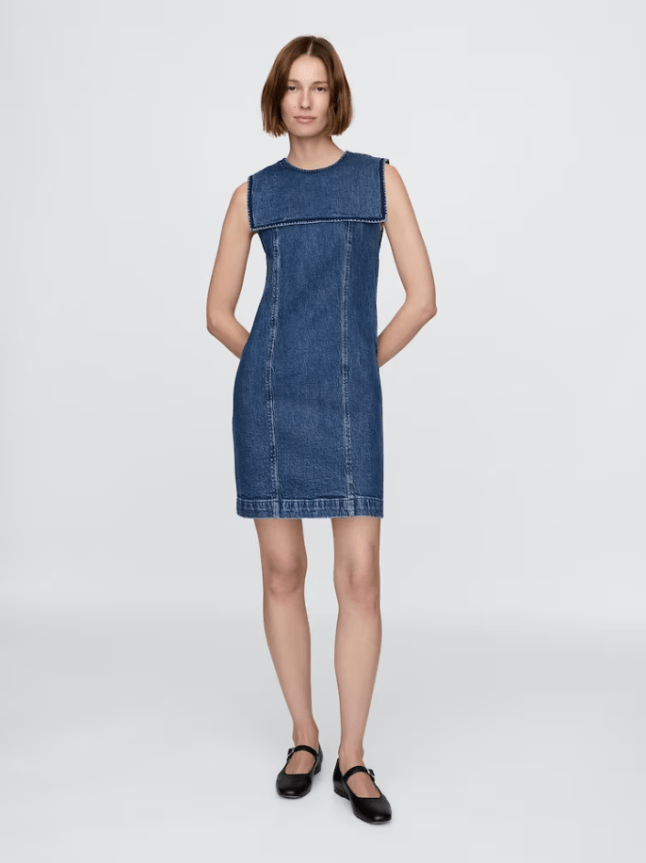 Model wears Blue DÔEN Denim Sailor Mini Dress