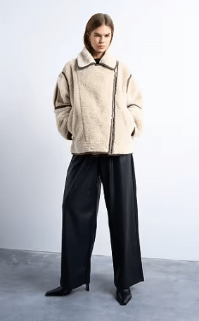 Female wears cream teddy-bear TOPSHOP jacket