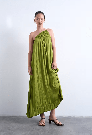 Female wears asymertric TOPSHOP pleated maxi dress