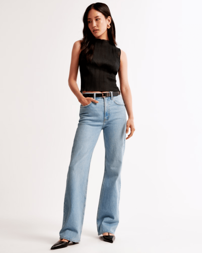 Female wears pale blue High Rise 90s Relaxed Jean