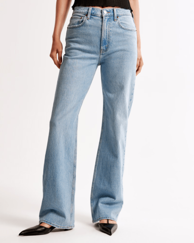 Female wears pale blue High Rise 90s Relaxed Jean