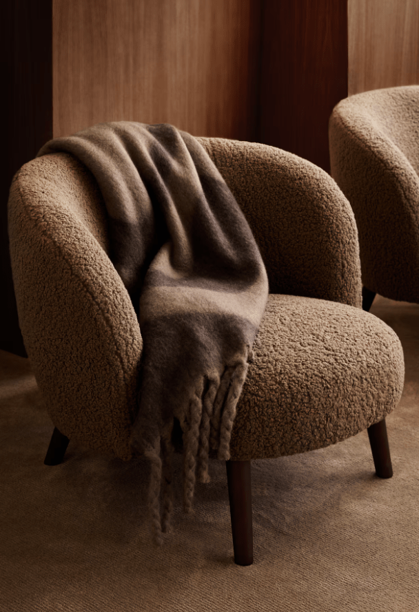 Chair with H&M Patterned Wool-Blend Blanket over the top