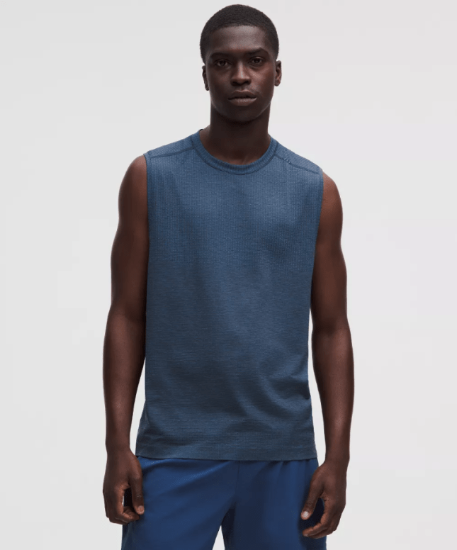 Male wears blue Lululemon Metal Vent Tech Sleeveless Shirt