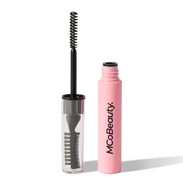 Pink tube with black wand and small bristles at the end