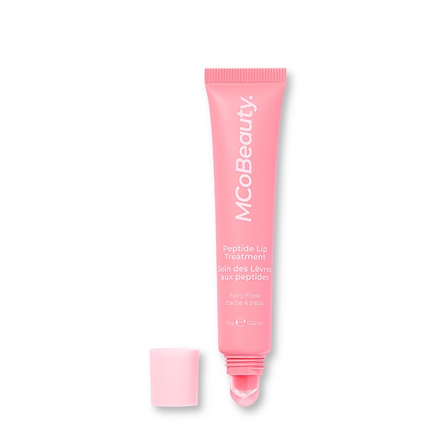 Pink tube with light pink cap next to product