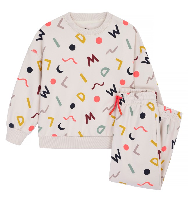 White sweater and jogger set with colourful print