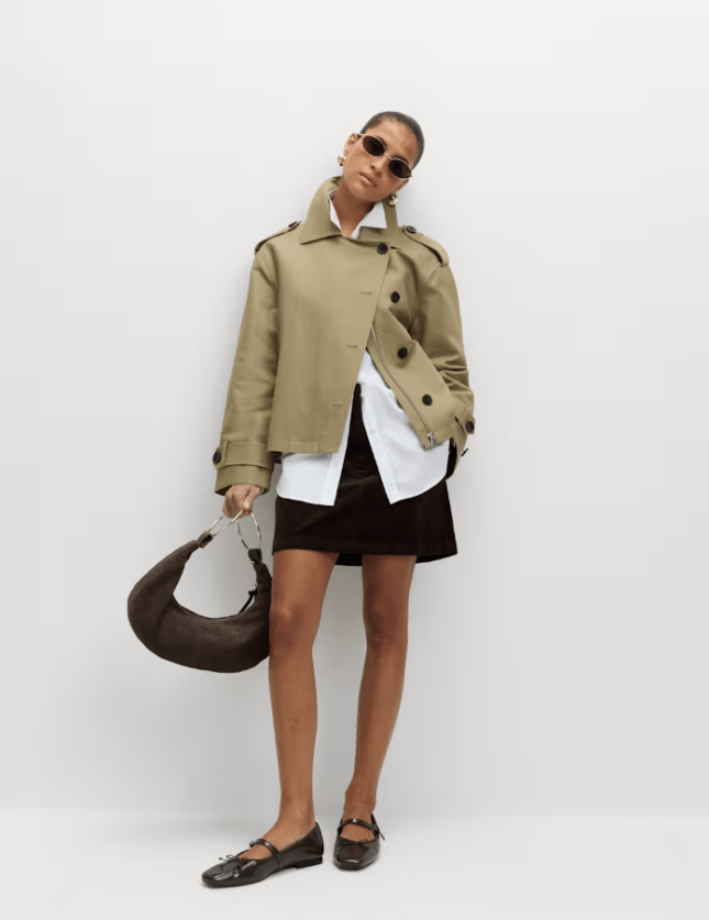 Female wears cropped M&S trench
