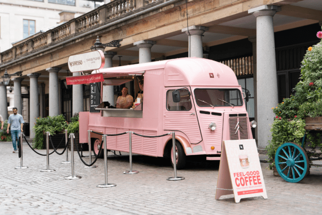 Pink coffee van, situated outdoors