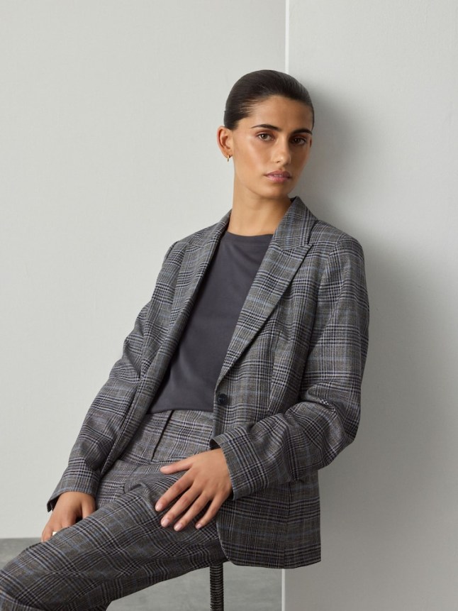 Female wears Next Grey/Blue Check Single Breasted Sculpting Blazer