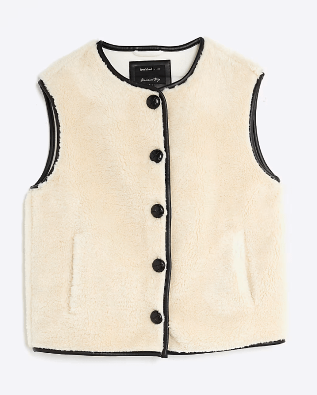 Lifestyle image of the River Island Cream Borg Button Gilet