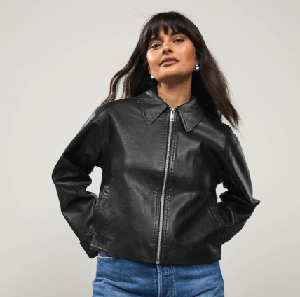 Female wears black Next jacket
