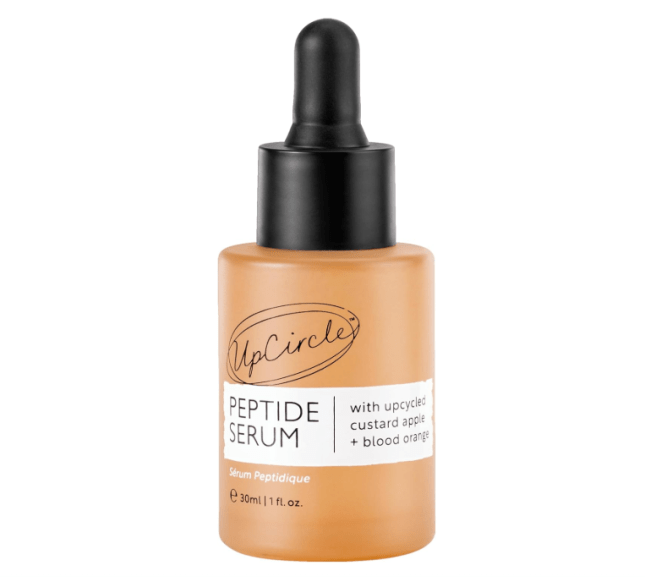 Orange bottle with black lid