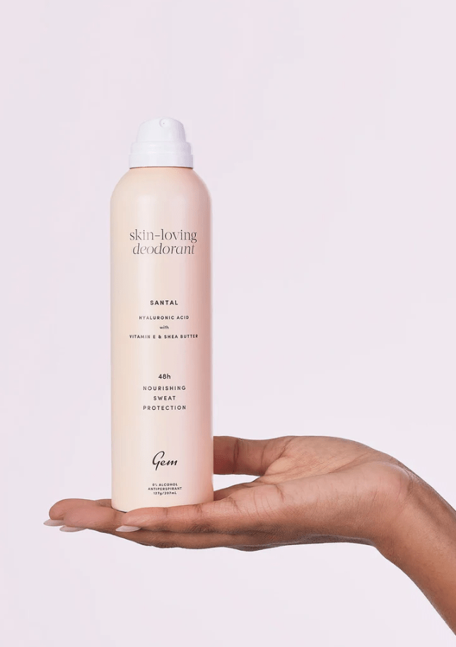 Hand holding Gem Skin-Loving Santal Antiperspirant Deodorant