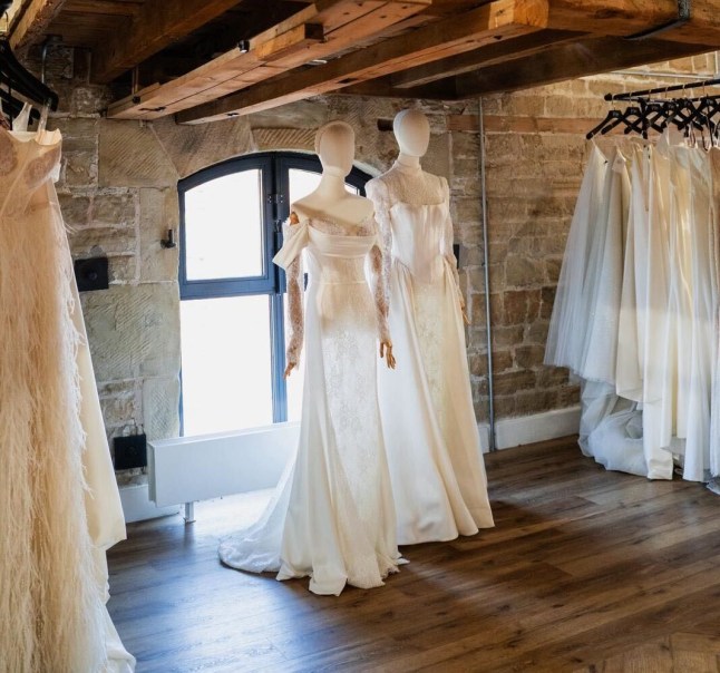 Wedding dresses on display inside Dotty Bridal