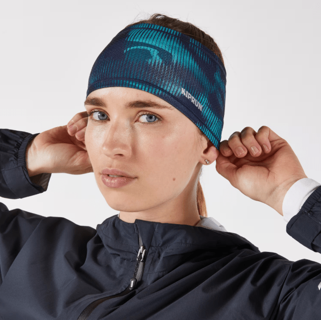 Female wears Kiprun Warm+ V2 Adult Warm Running Headband