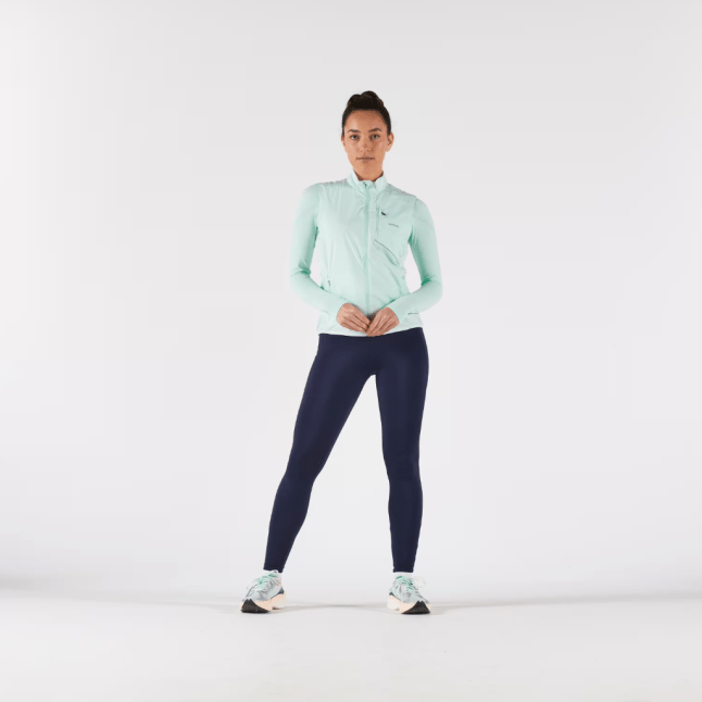 Female wears KIPRUN Run Wind 500 Women's Sleeveless Running Jacket
