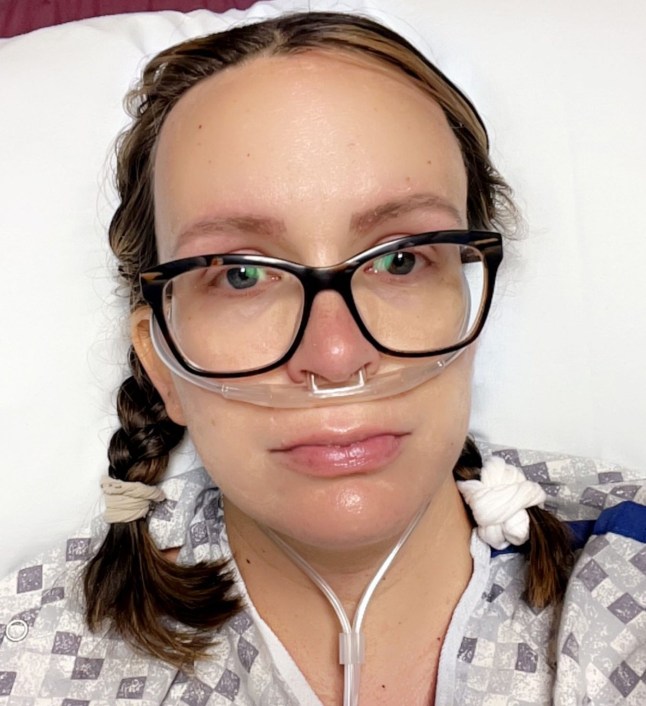 Danika in hospital with a tube in her nose