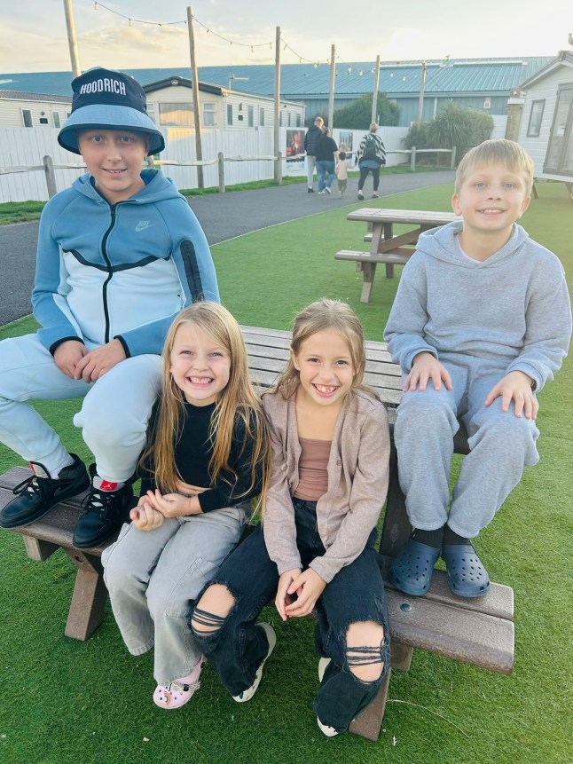 Tyler Scott, with bis siblings. // A teen was diagnosed with stage four cancer after doctors initially thought he had tonsilitis. Tyler Scott, 13, has gone from competing in cheerleading events in the US to undergoing intense chemotherapy which leaves him 'lifeless'. Mum Charley Hemming, 33, suspected something was wrong after she started spotting lumps on her son's neck in the summer of 2024. Now the family of six from Gosport in Hampshire have had their lives 'turned upside down' as brave Tyler battles Hodgkin Lymphoma. Photo released 28/10/2025