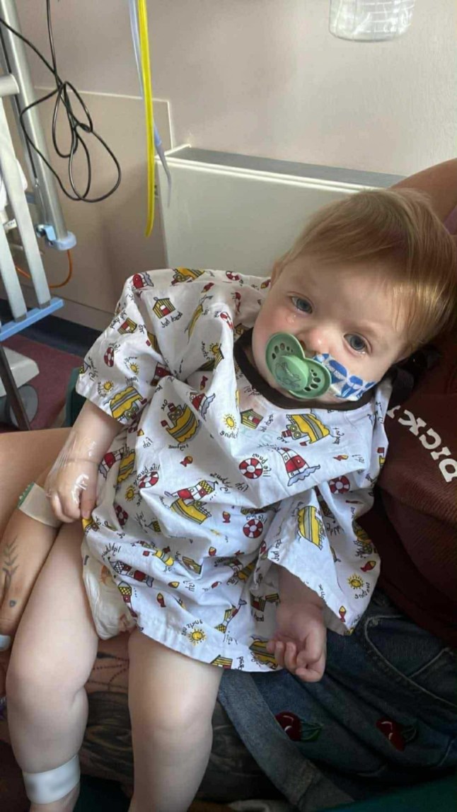 Baby Otto Acreman, in hospital. // A one-year-old baby was diagnosed with a rare form of cancer after doctors initially thought his breathing problems were a cold. Otto Acreman's smitten parents are living a 'nightmare' after a spot at a family barbecue led to the devastating stage four diagnosis. Mum Sophie Reddaway, 25, and dad Paul Acreman, 27, were over the moon when they welcomed their first child was born in September 2024. Weighing seven lbs and three ounces, 'beautiful' Otto's birth was 'the best time' in the couple from Okehampton, Devon's lives. Photo released 29/10/2025