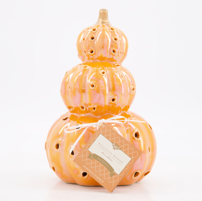 Three pumpkins stacked on each other