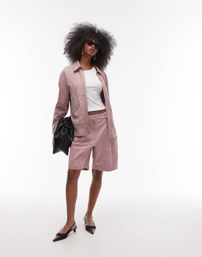 Female wears pink co-ord from Topshop