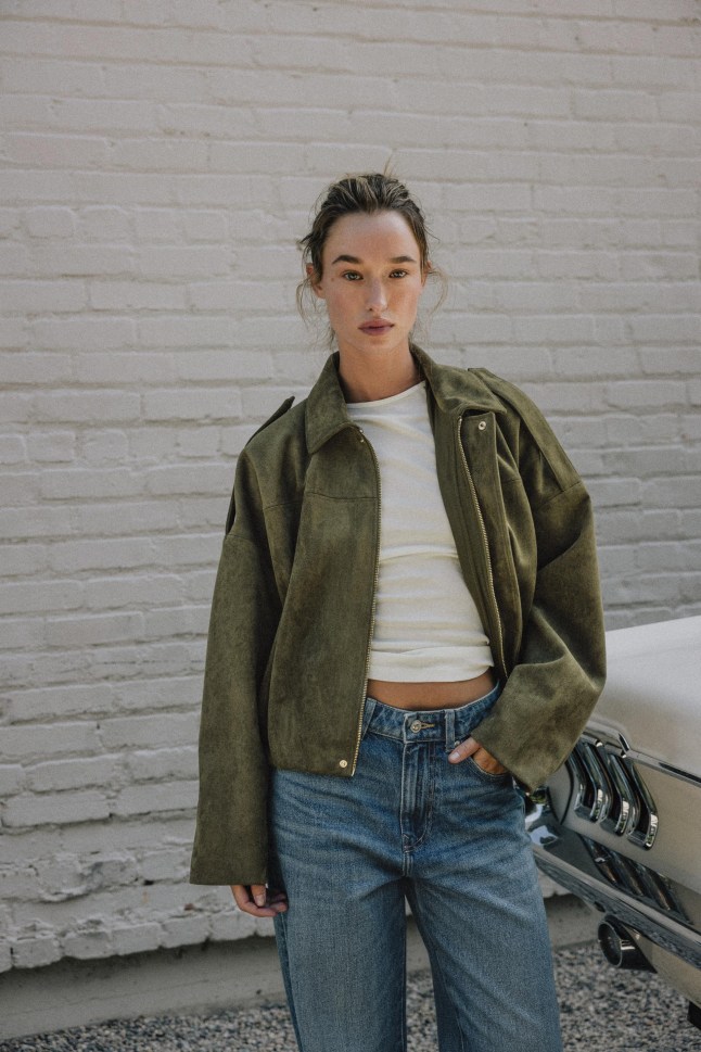 Model wears green Zara jacket