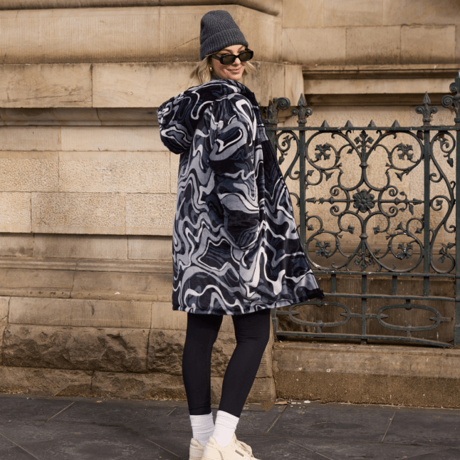 Female wears puffer jacket from Oodie