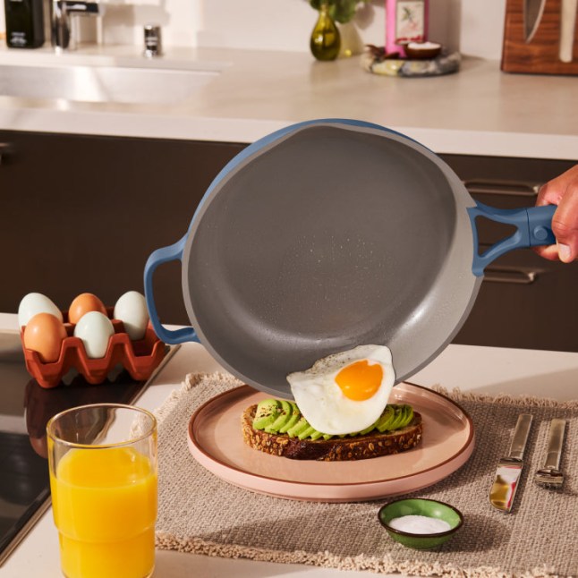 Egg slipping from non-stick pan onto avocado toast