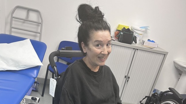 Debbie Whitehouse smiles to the camera