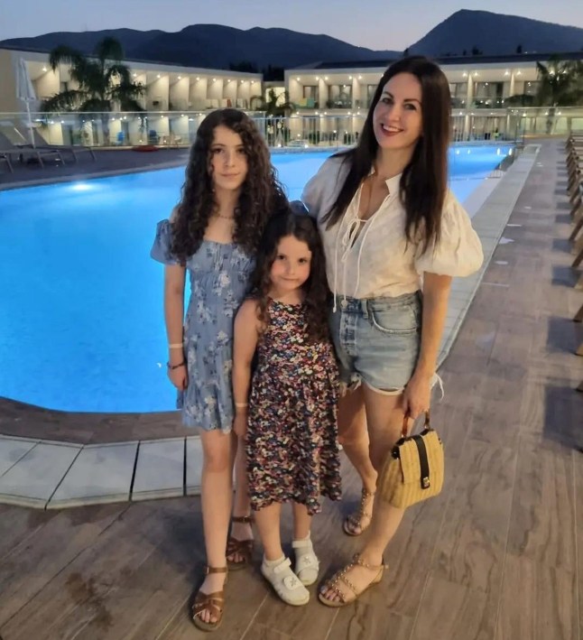 Victoria and her two daughters on holiday