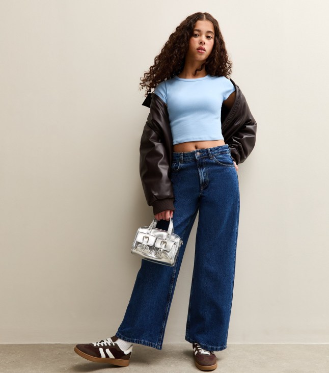 Female wears blue jeans