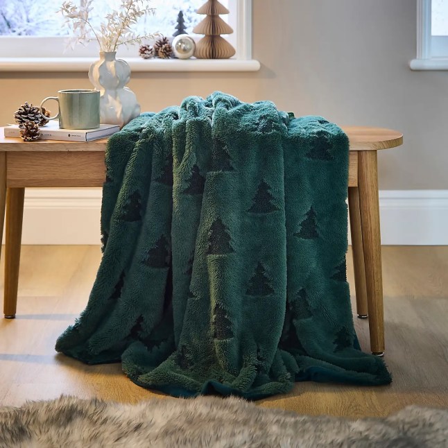 Green fleece with trees printed on