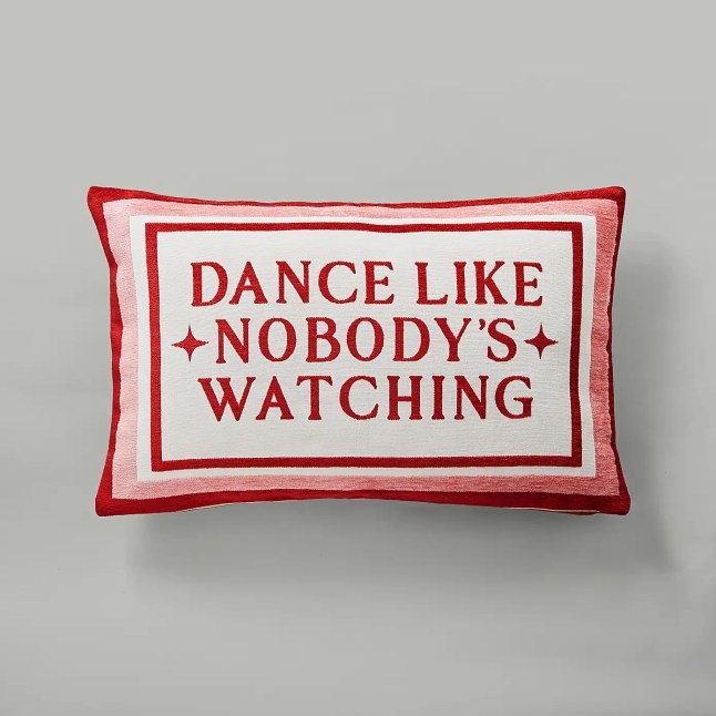 Cushion with writing across the front