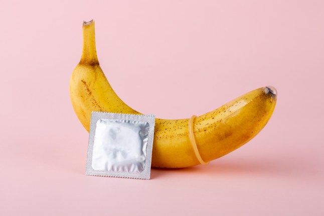 Condom and yellow banana