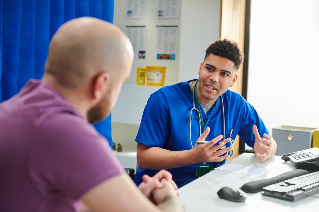 hospital doctor explaining to patient