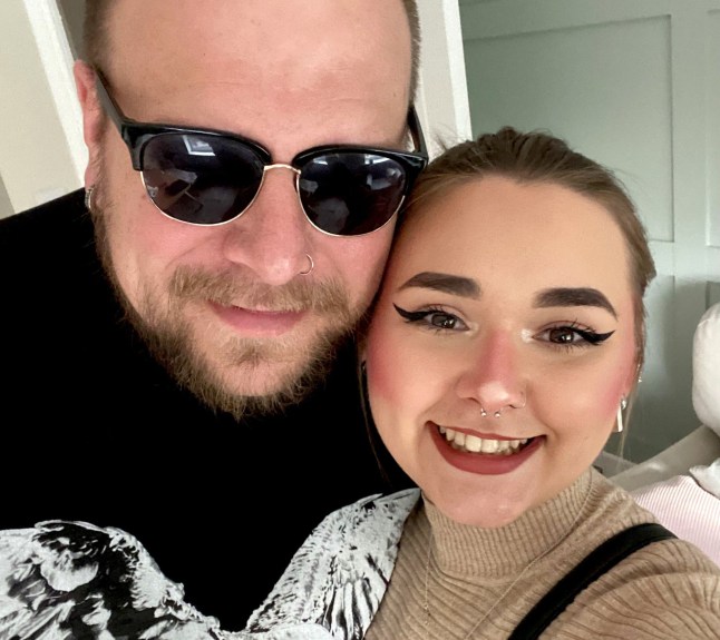 PIC FROM Kennedy News and Media (PIC SHOWS: COURTNEY STOCKS, 22, WITH HER DAD CHRIS WATCHORN, 40, WHO SAVED HER LIFE WHEN SHE WENT INTO CARDIAC ARREST) A fit and healthy dog-groomer was brought back to life by her dad after suffering a cardiac arrest in her back garden - brought on by the 'stress of her job'. Courtney Stocks, who lives in Ilkeston, Derbyshire, was at home on Sunday November 16th when her parents came round for a visit. The 22-year-old went outside to her back garden when she suddenly collapsed onto the ground. DISCLAIMER: While Kennedy News and Media uses its best endeavours to establish the copyright and authenticity of all pictures supplied, it accepts no liability for any damage, loss or legal action caused by the use of images supplied and the publication of images is solely at your discretion. SEE KENNEDY NEWS COPY - 0161 697 4266