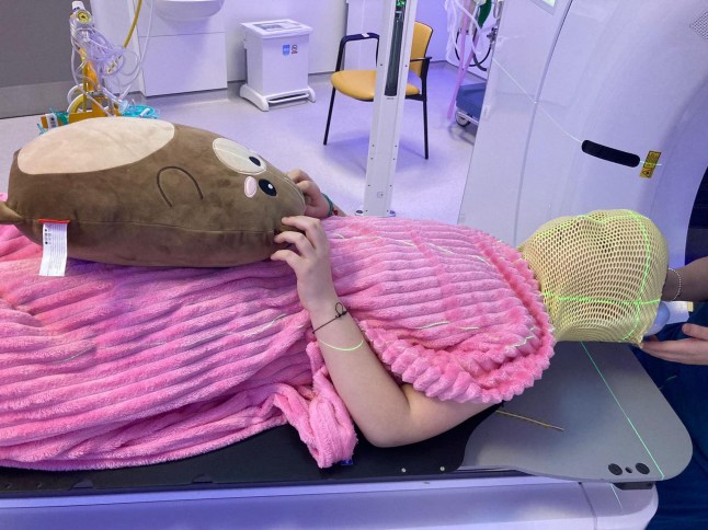 Pic from Kennedy News/ Ania Hough (Pictured:JAMIE HOUGH, NOW 10, PREPARING FOR PROTON BEAM THERAPY IN 2024.) A mum thought her son was being 'silly' by not walking properly until discovering it was a symptom of cancer - claiming their Christmas Day walk 'saved his life'. Ania Hough, from Staplehurst in Kent, said her then eight-year-old son Jamie Hough had first complained of a headache in October 2023 and started vomiting. Initially, the mum-of-two thought he had picked up a school sickness bug but after calling 111 she took him to A&E at Maidstone Hospital in Kent. DISCLAIMER: While Kennedy News and Media uses its best endeavours to establish the copyright and authenticity of all pictures supplied, it accepts no liability for any damage, loss or legal action caused by the use of images supplied and the publication of images is solely at your discretion. SEE KENNEDY NEWS COPY - 0161 697 4266