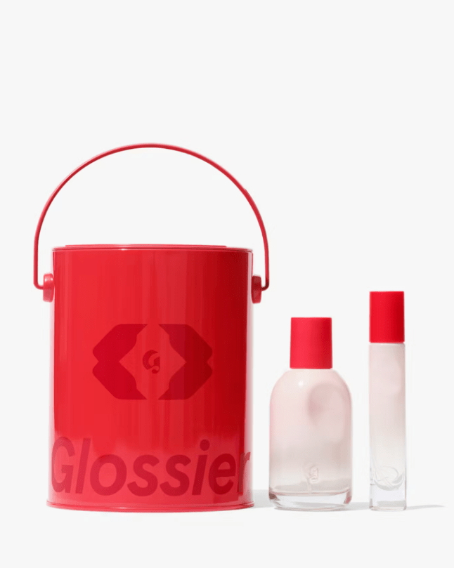 Red can with fragrance bottle and small spray
