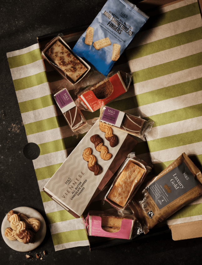 Biscuits and chocolate on a green and white stripe towel