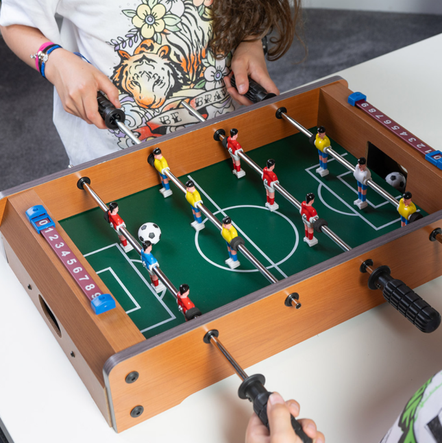 Children playing table pool
