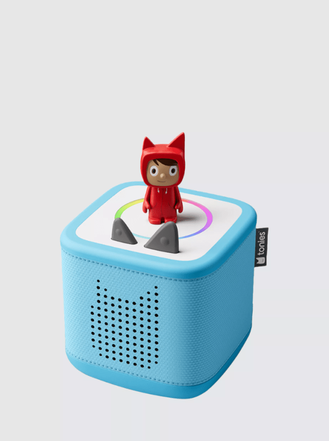 Blue plastic box with small figure on the top