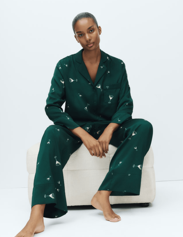 Female wears green printed pjs