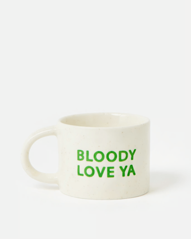 White mug with green text saying 'Oliver Bonas Bloody Love Ya'