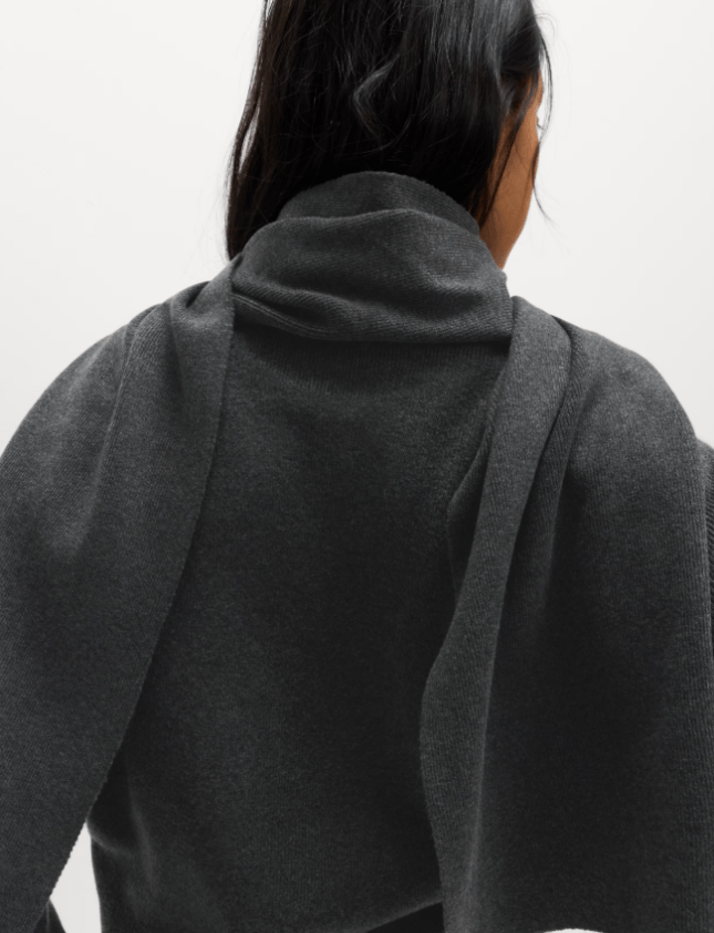 Back of female with scarf down the back