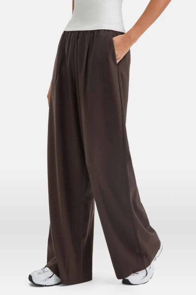 Female wears brown joggers