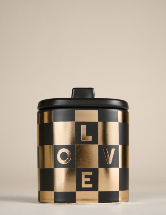 Black and gold pot with checked print